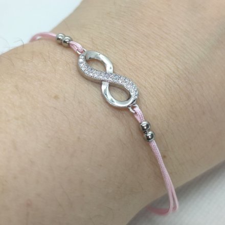 Srebrna bransoletka damska na różowym sznureczku z nieskończonością GR34 • Srebro 925