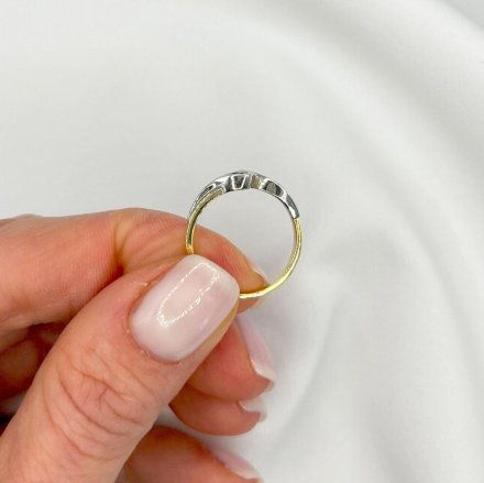 Złoty pierścionek zaręczynowy dwa kolory z diamentem r.11 • Złoto 585 1,66g Brylant 0,04ct H